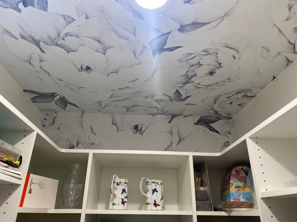 Ceiling covered with the black and white peonies wallpaper