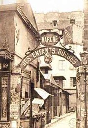 SEpia photo of the original entrance to the marche des Enfants Rouges. 
